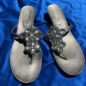 Grey jeweled flip flops